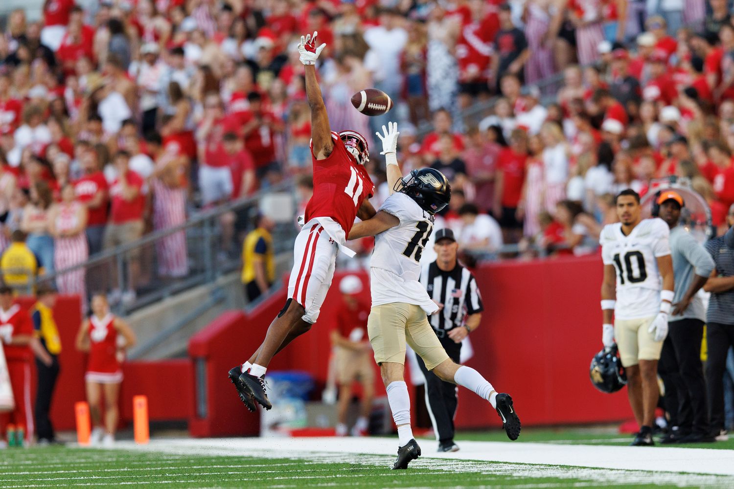 Wisconsin cornerback Alexander Smith in coverage against Purdue wide receiver Charlie Jones.